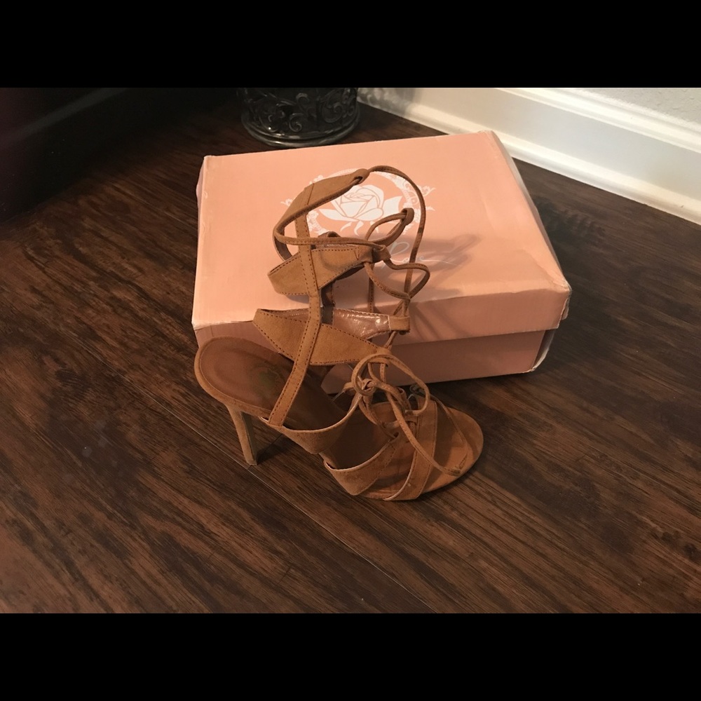 Lace up camel colored heels size 7 barely worn .